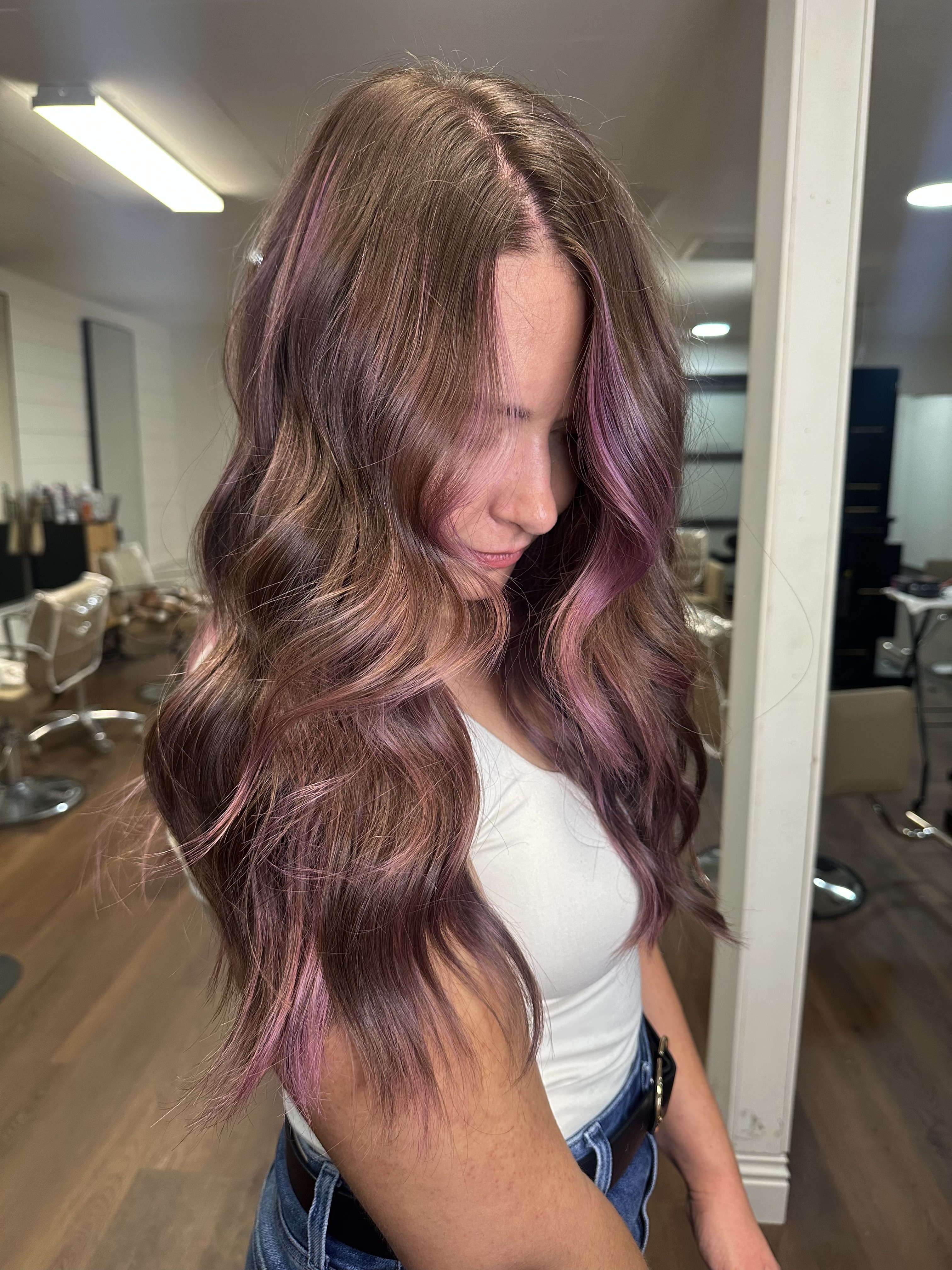 Client brunette with pink and mauve highlights